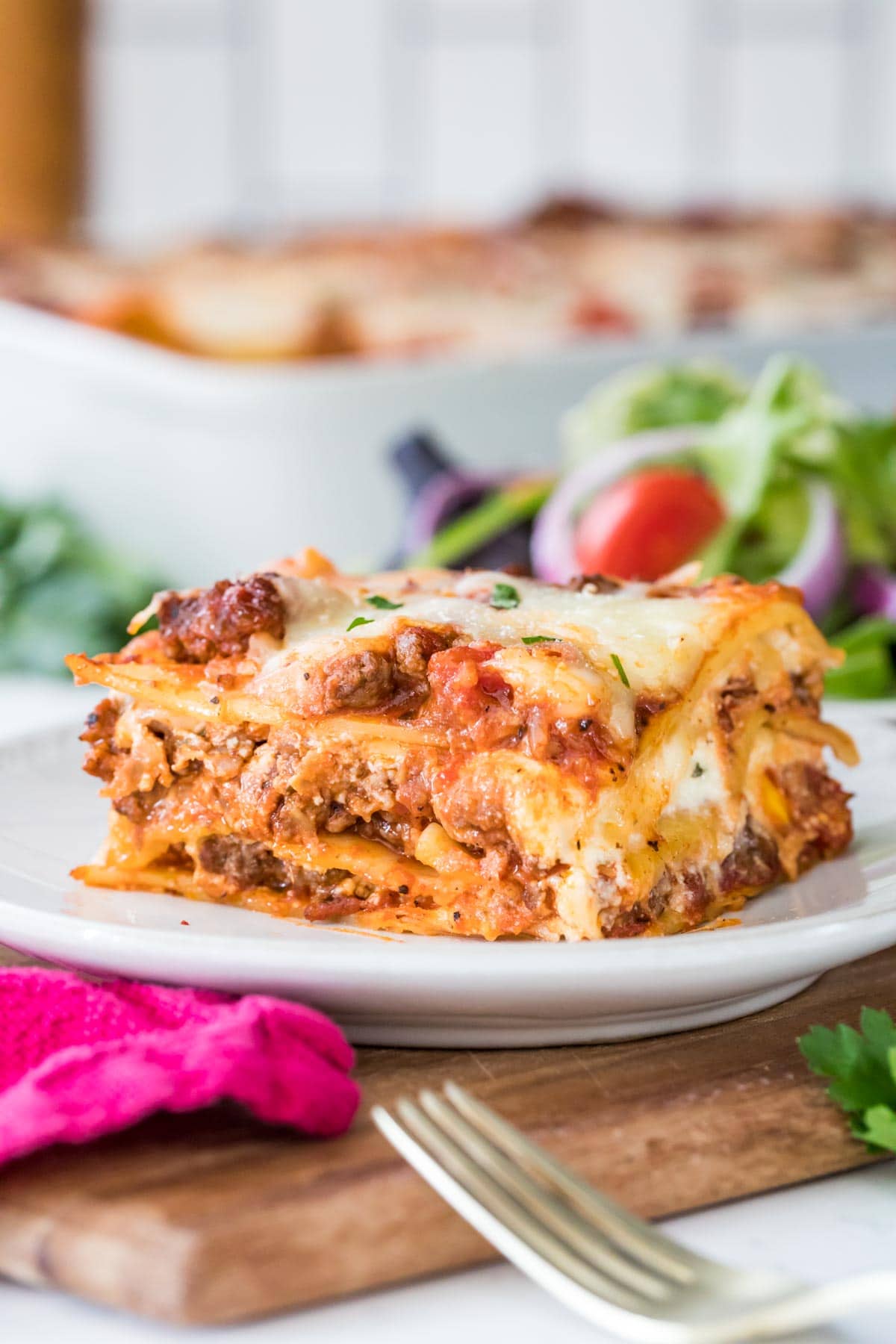 Finished lasagna on a white plate