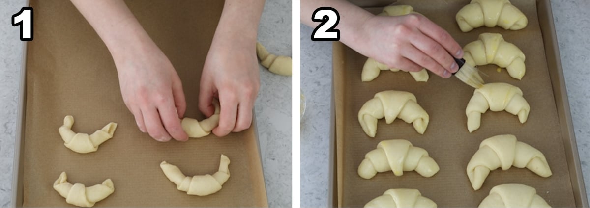 Crescent rolls being places on lined baking tray and brushed with an egg wash