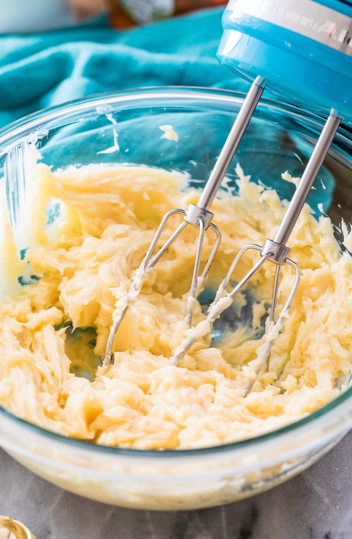 Butter and honey mixed with an electric hand mixer.