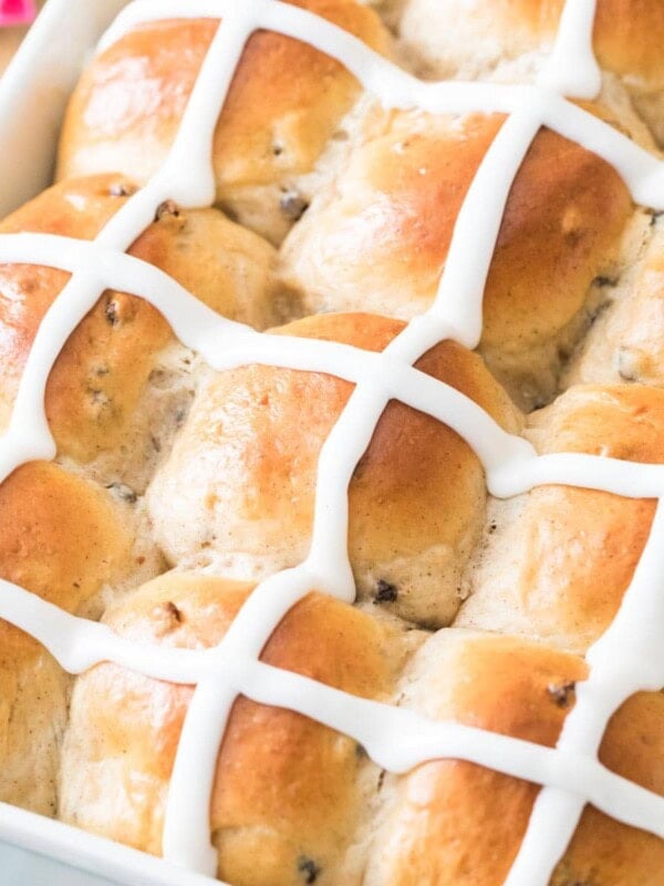 Closeup of iced hot cross buns.