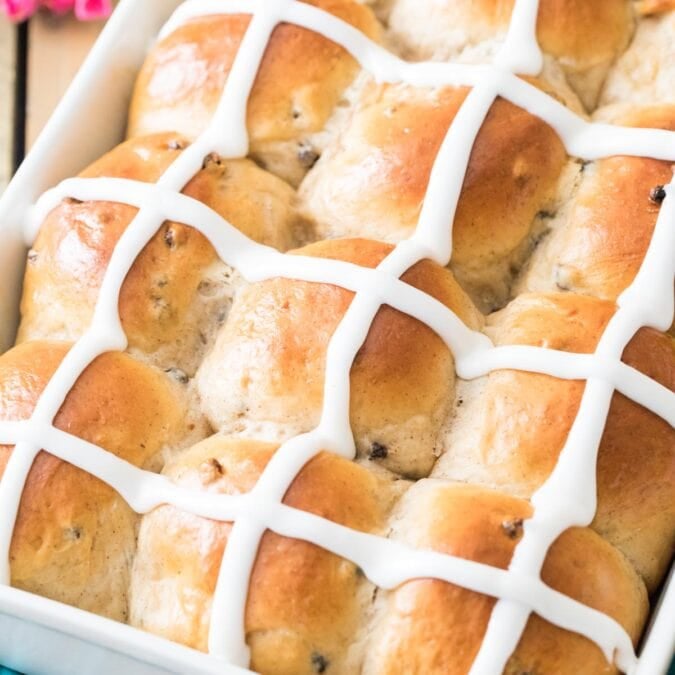 Closeup of iced hot cross buns.