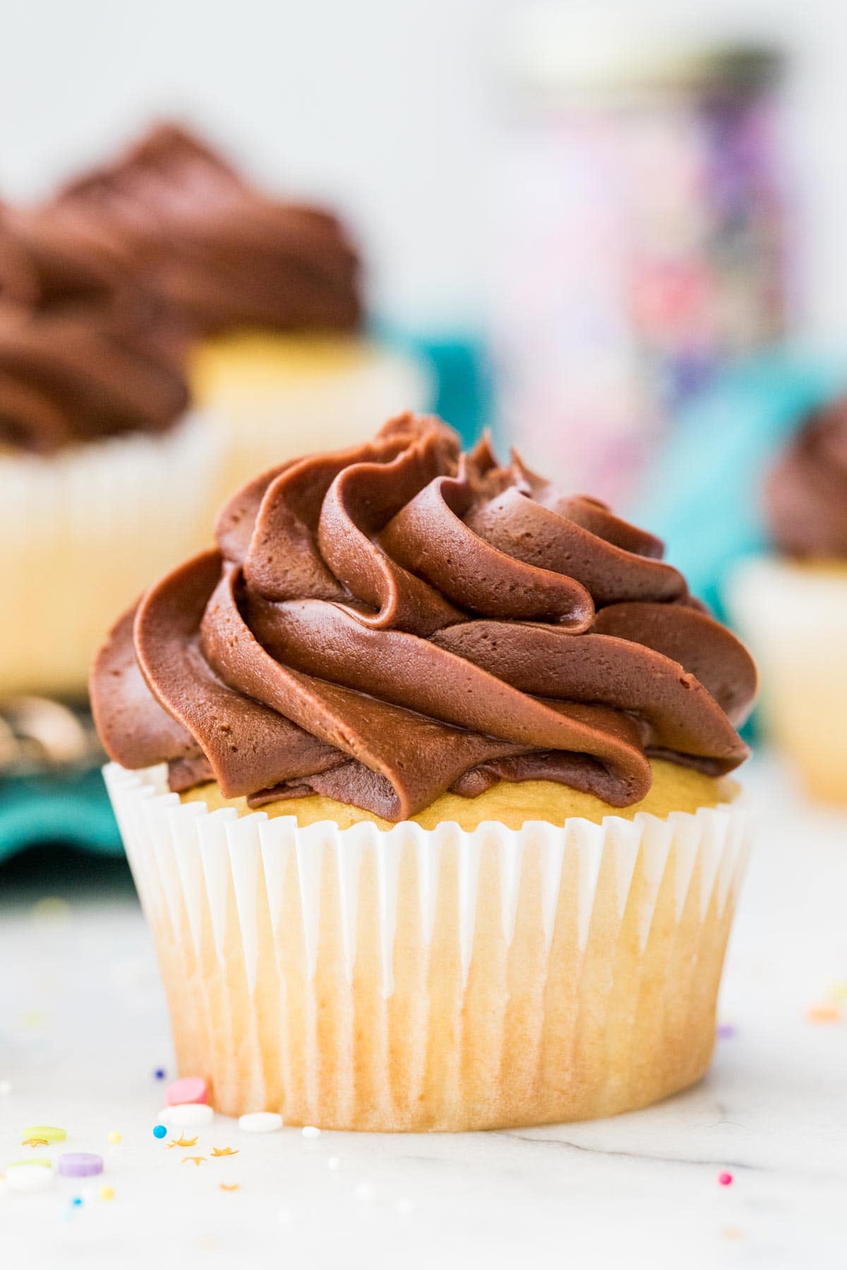 Chocolate fudge frosting on a cupcake