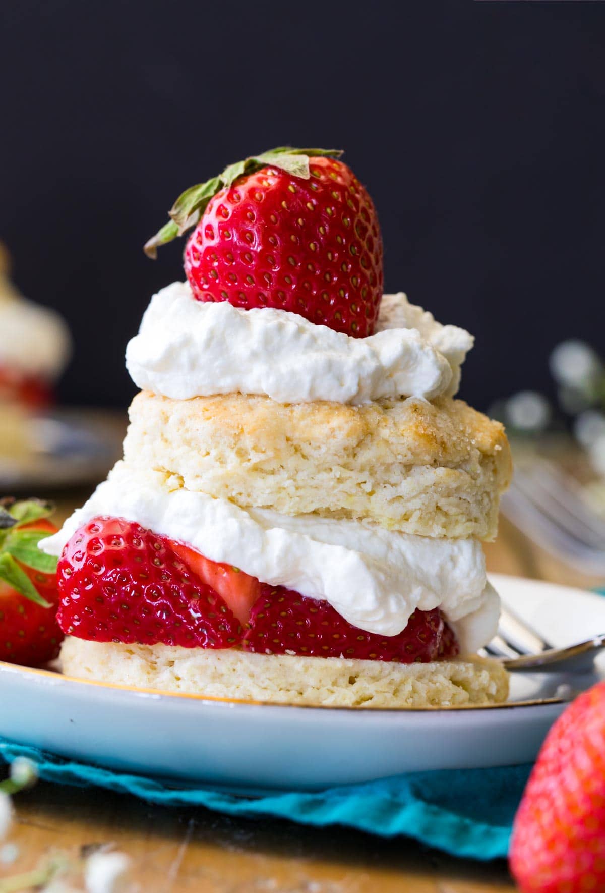 Strawberry shortcake on a white plate.