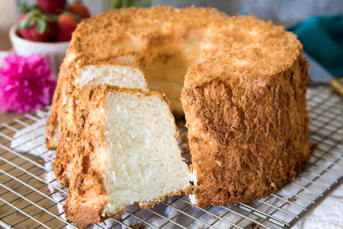 Slices of cake next to whole cake