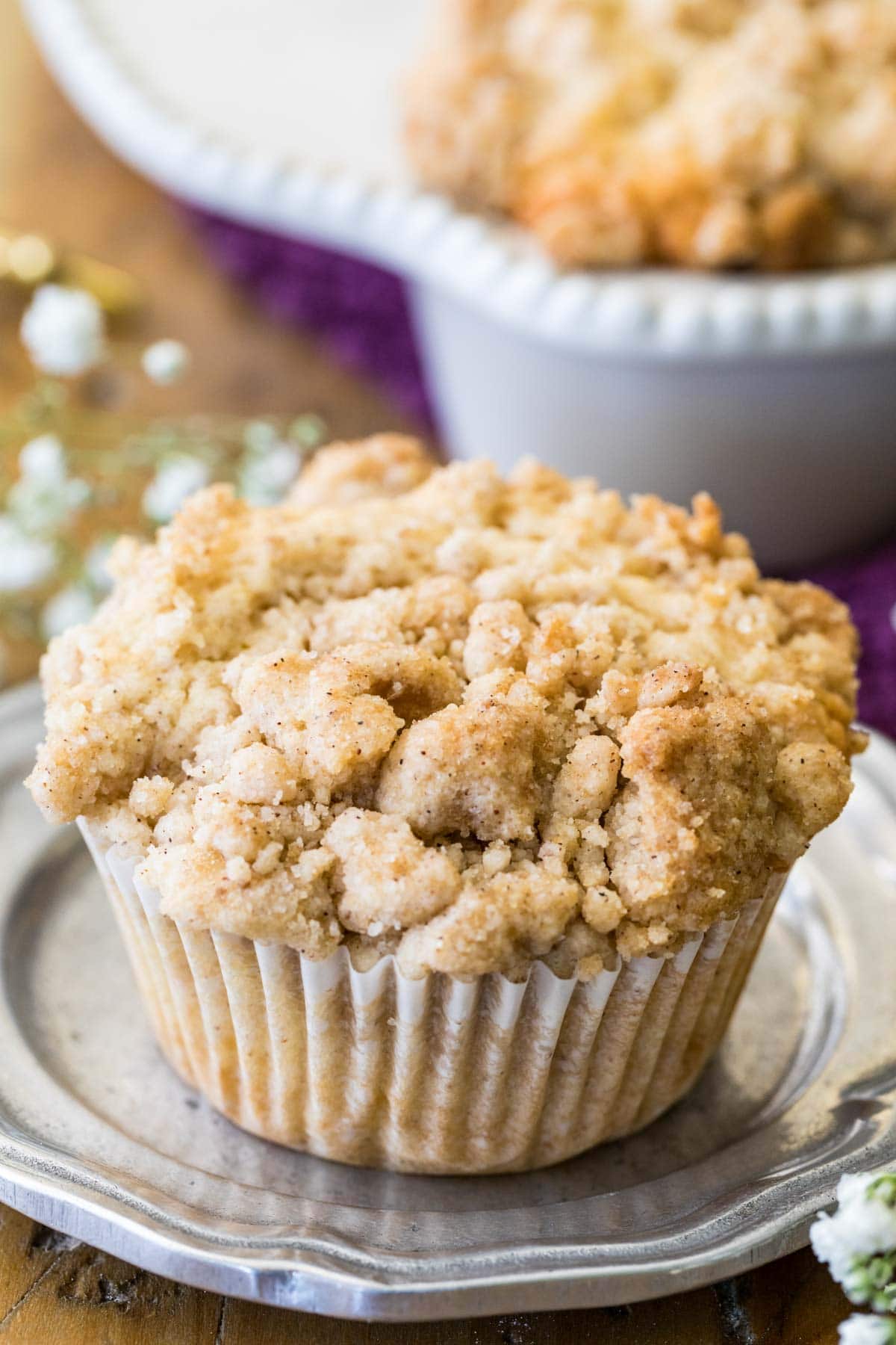 Crumb topping piled on a muffin.