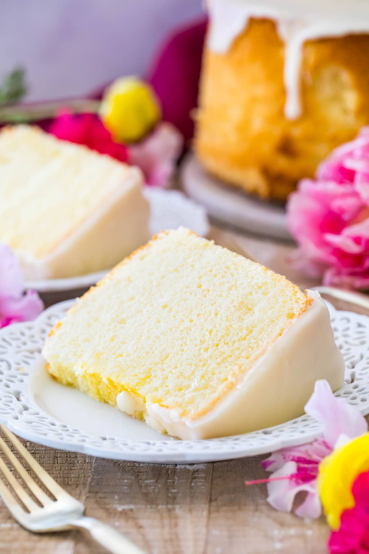 Slice of fluffy chiffon cake on a white plate