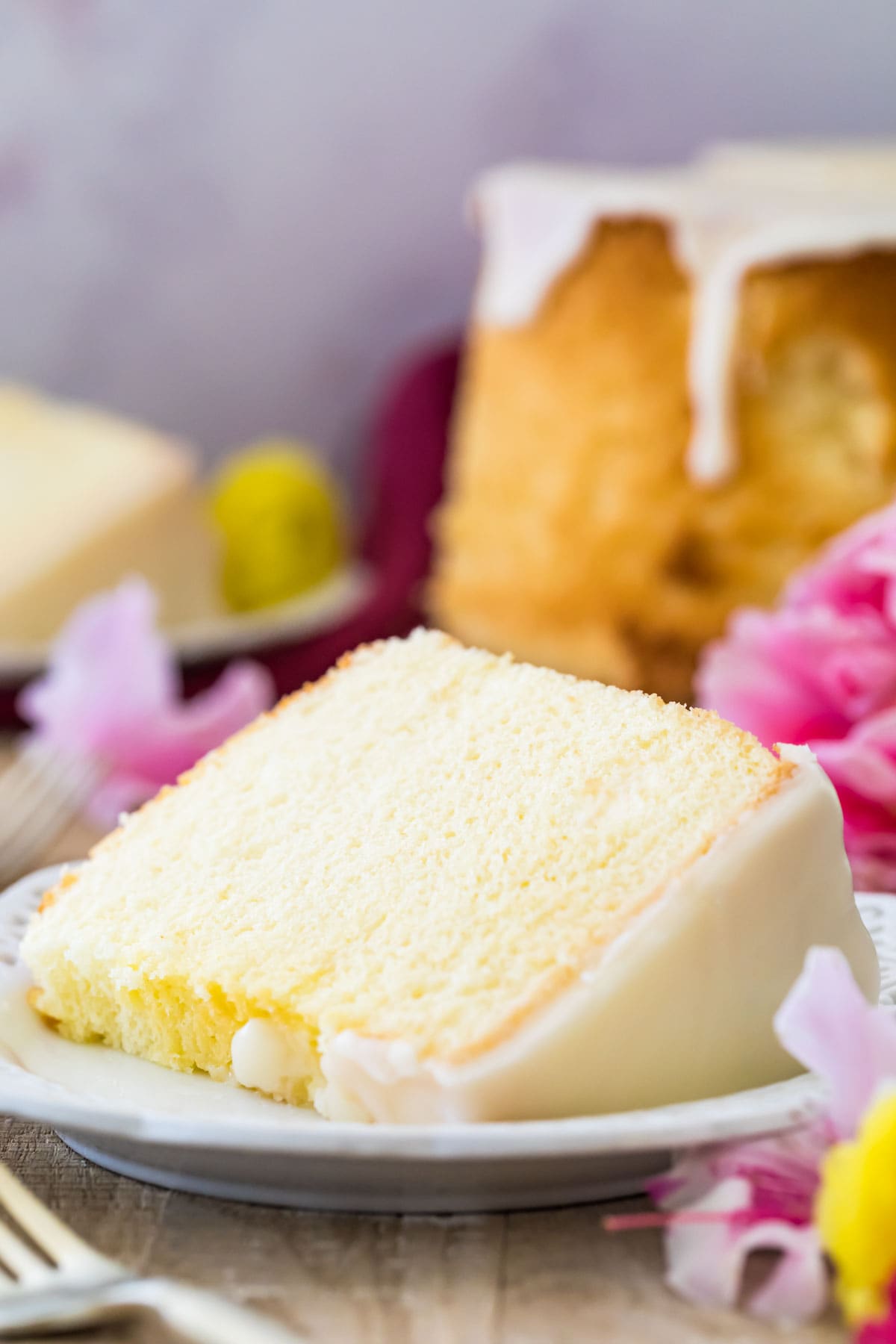 Slice of fluffy chiffon cake on a white plate