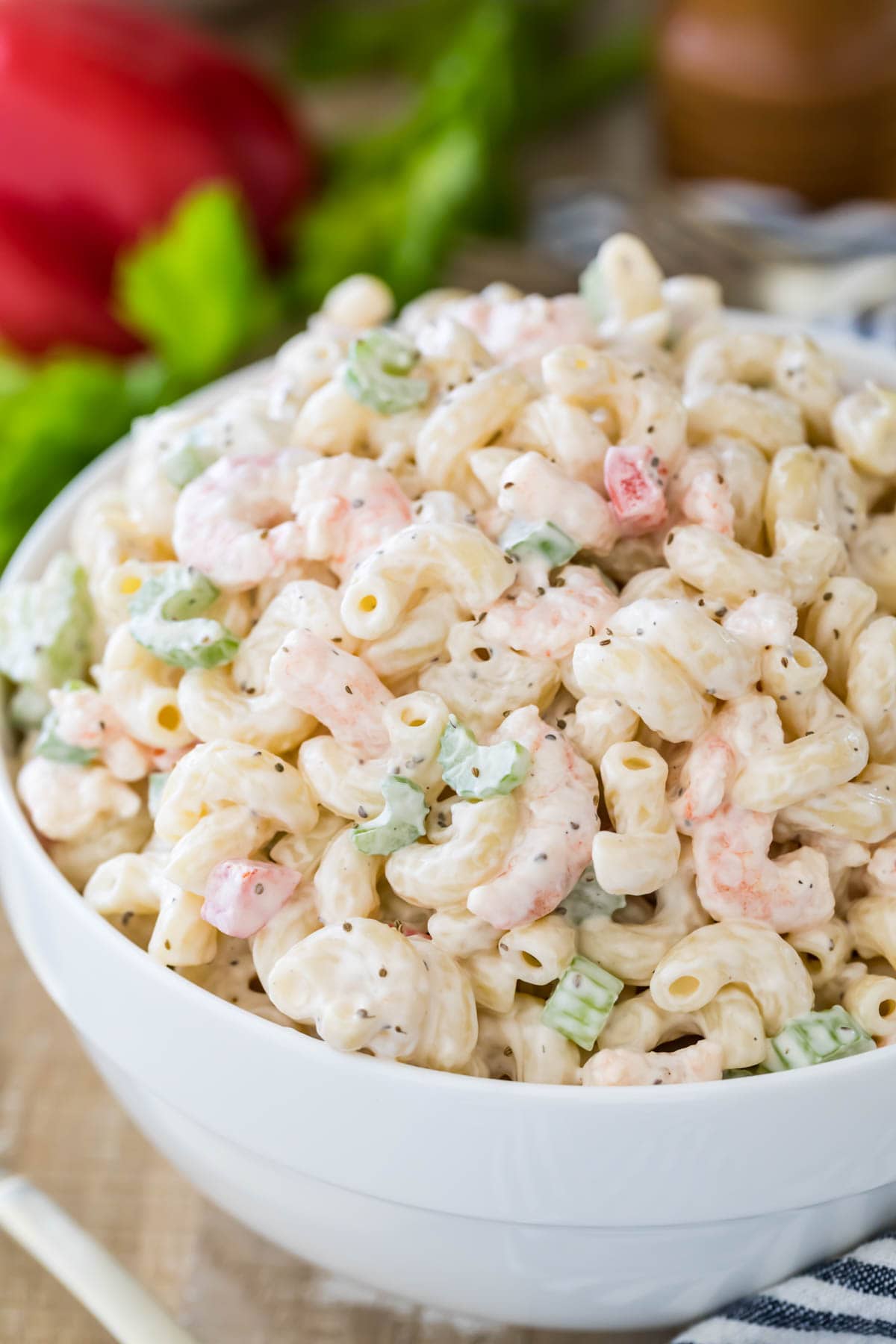 White bowl filled with shrimp pasta salad