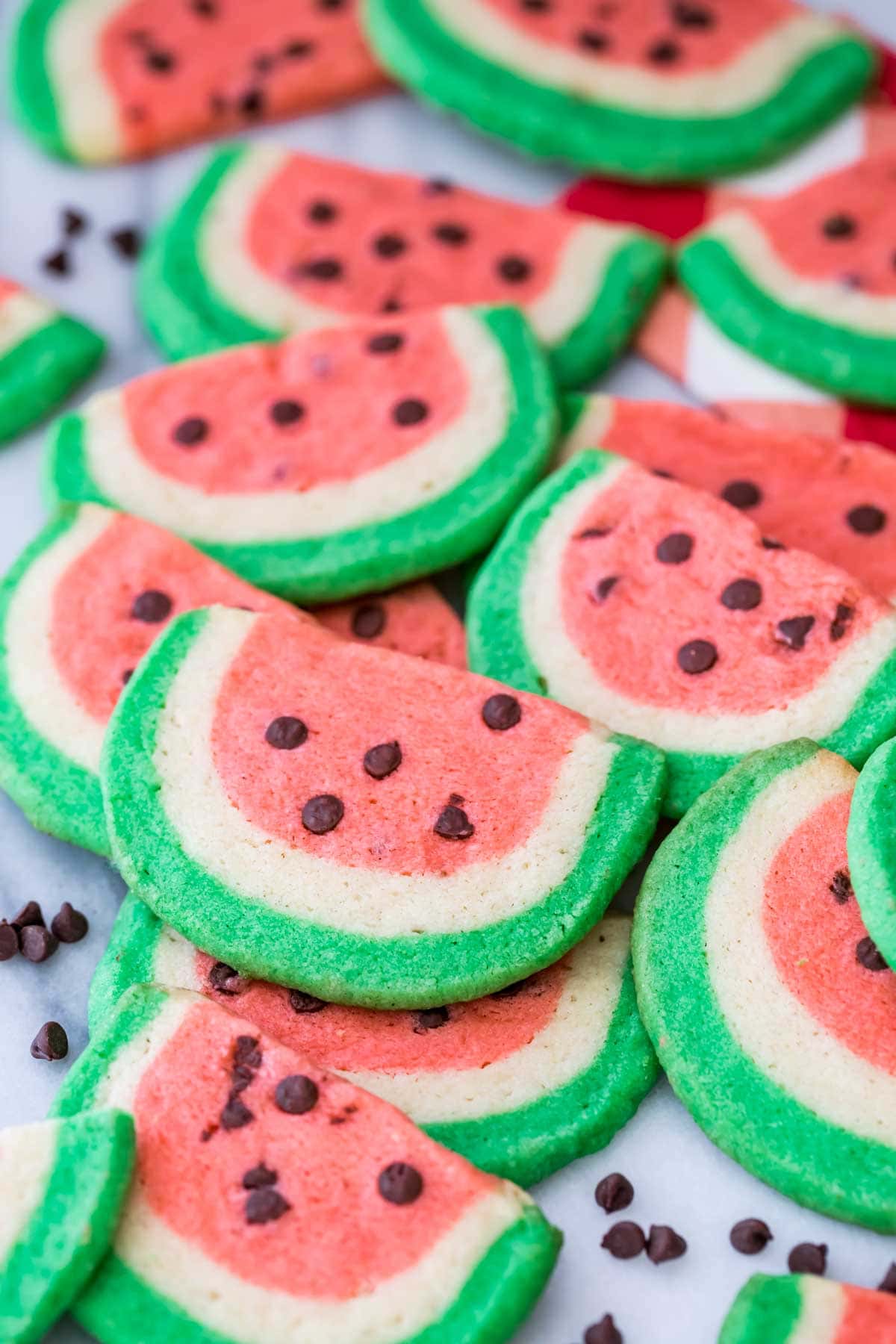 sugar cookies shaped and colored like watermelon slices