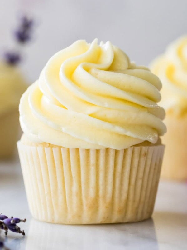 side view of cupcake frosted with thick, silky German buttercream icing