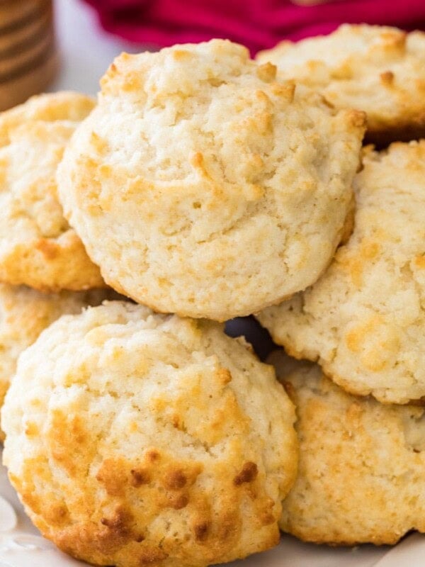 Homemade drop biscuits stacked in a pile