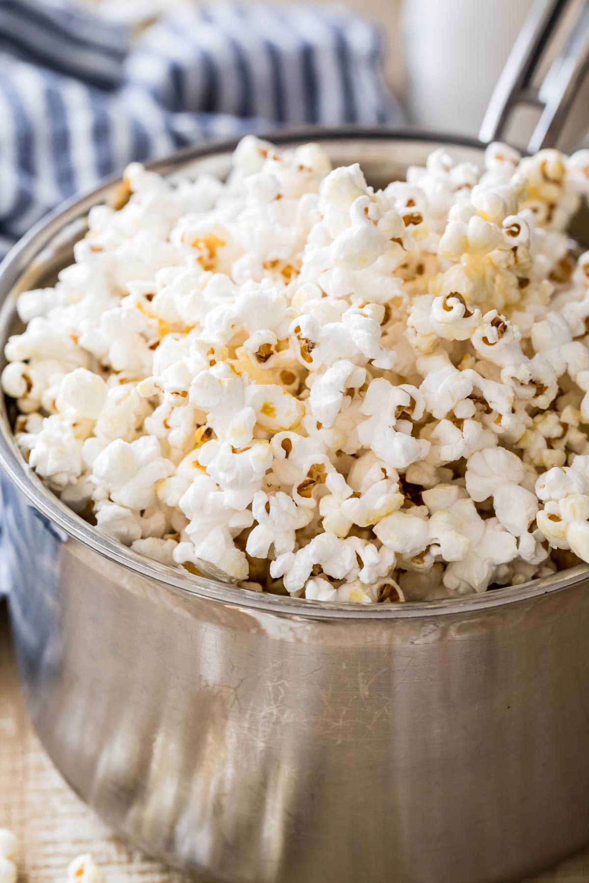 shiny metal pot full of kettle corn