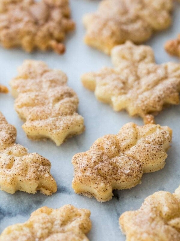 leaf shaped pie crust cookies dusted with cinnamon sugar