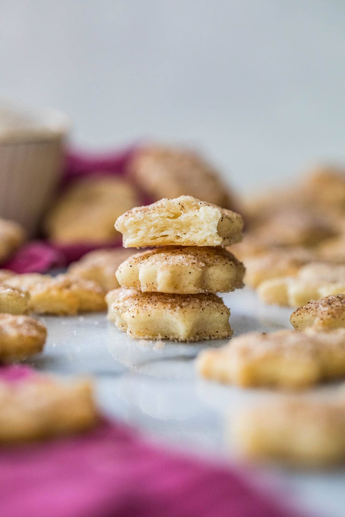 stack of pie crust cookies dusted with cinnamon sugar