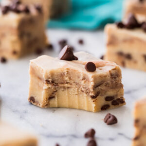square of cookie dough fudge missing one bite among other fudge squares