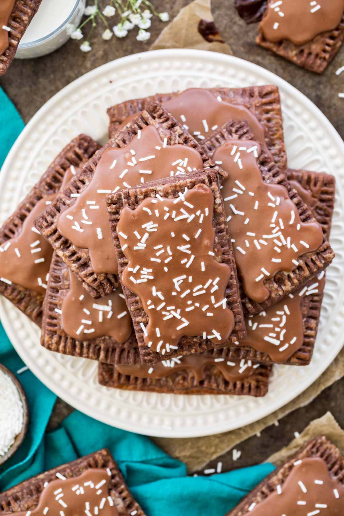 white plate topped with a pile of homemade chocolate pop tarts