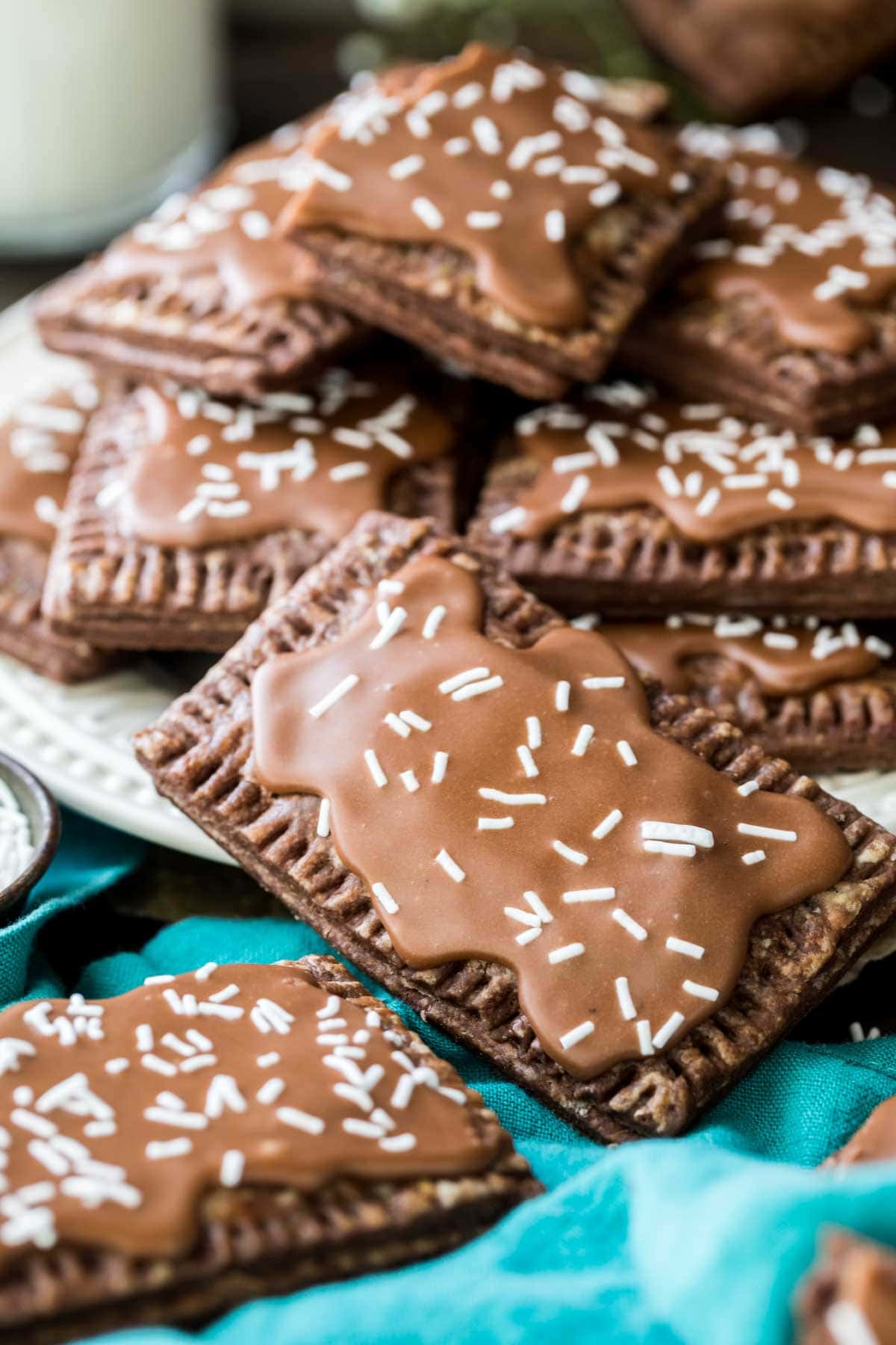 homemade chocolate pop tarts overflowing on white plate