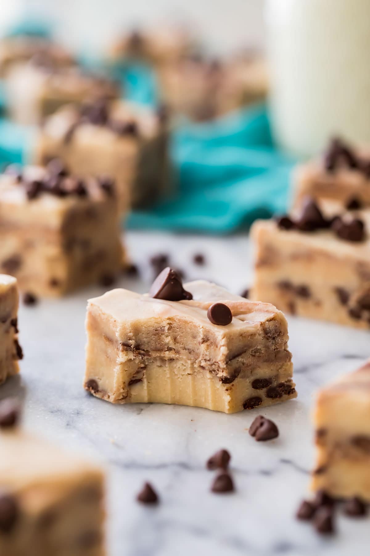 square of cookie dough fudge missing one bite among other fudge squares