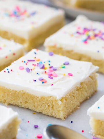 neatly cut frosted sugar cookie bars arranged in rows