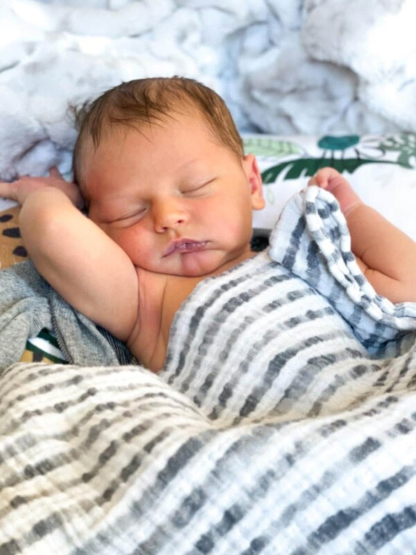 baby boy sleeping in lounger