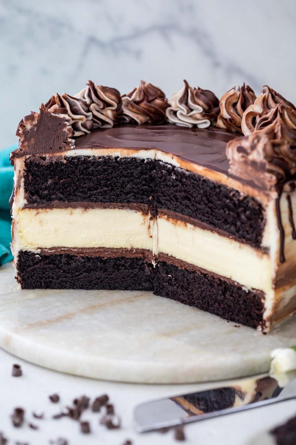 Cheesecake Stuffed Chocolate Cake - Sugar Spun Run