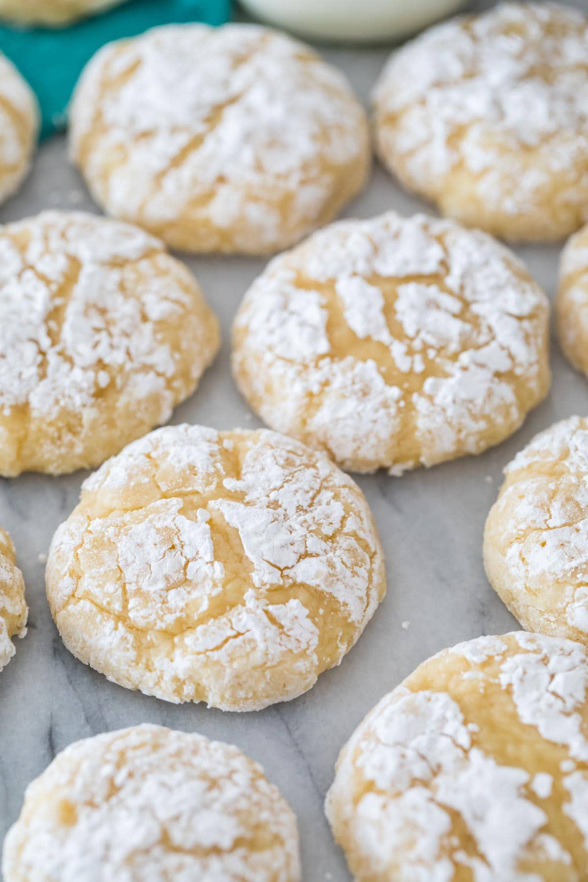 neat rows of gooey butter cookies with crinkly, powdered sugar tops