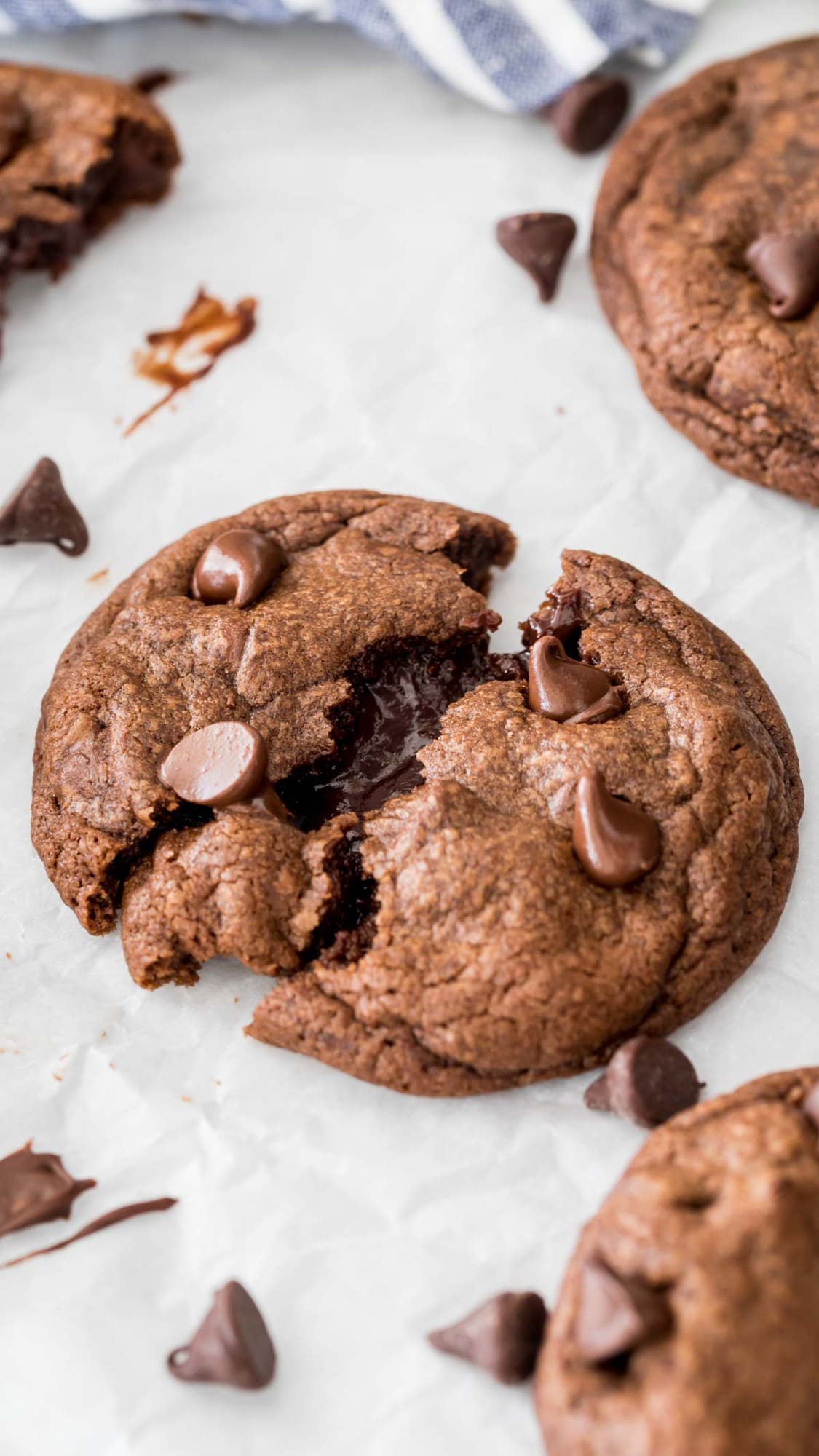 a fudge cookie that's just been split in two, with fudge flowing from the center