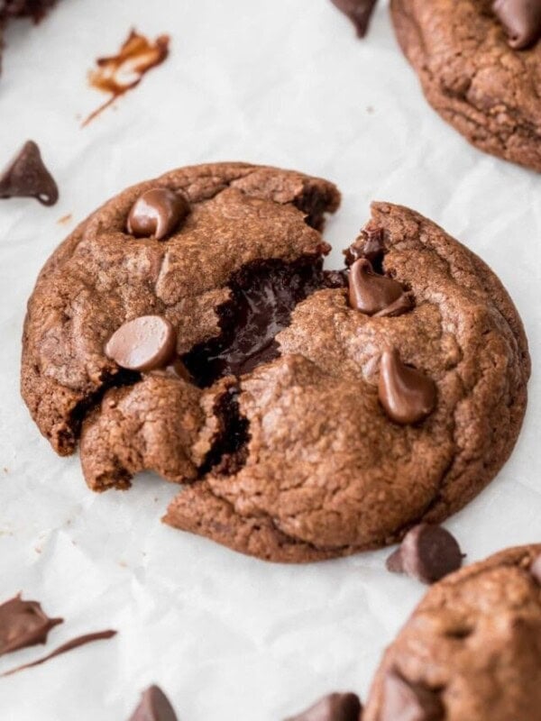 a fudge cookie that's just been split in two, with fudge flowing from the center