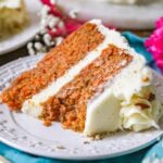 Close-up of a slice of my carrot cake recipe with a bite missing.