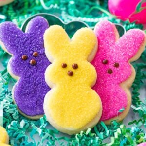 three colorful easter sugar cookies decorated like bunny peeps
