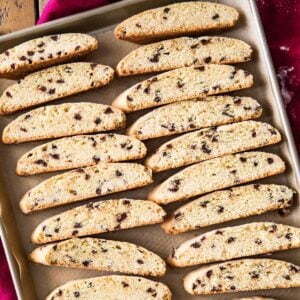 overhead view of homemade biscotti cookies cooling on a cookie sheet