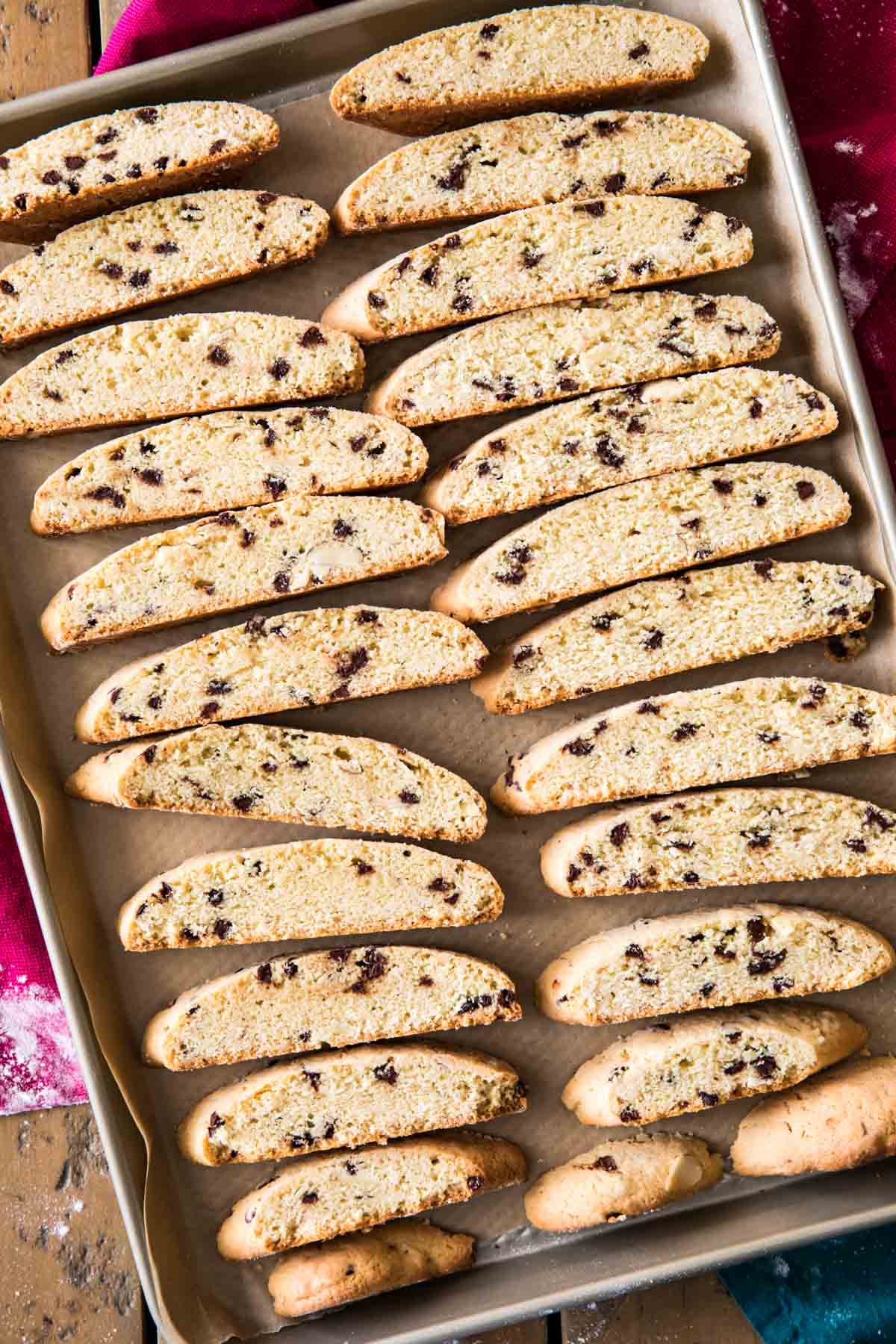 overhead view of homemade biscotti cookies cooling on a cookie sheet