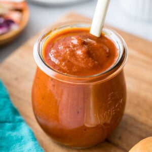 small glass jar of homemade BBQ sauce