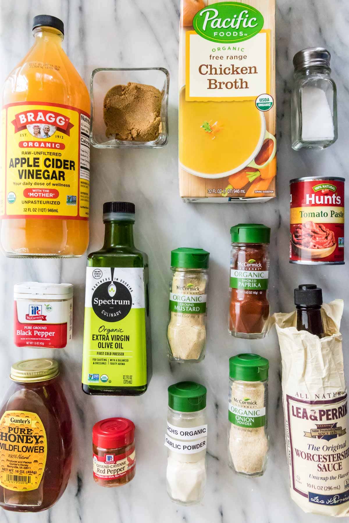 overhead view of ingredients including apple cider vinegar, honey, smoked paprika, and more