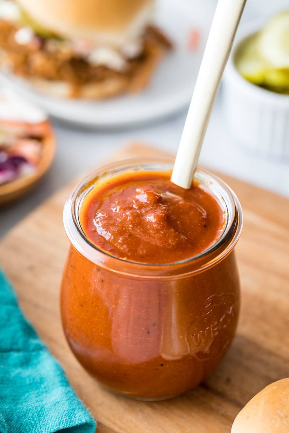 small glass jar of homemade BBQ sauce