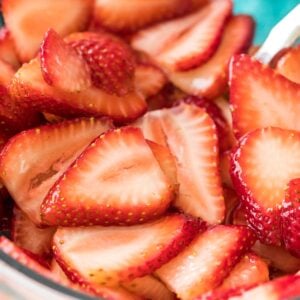 close-up shot of sliced macerated strawberries