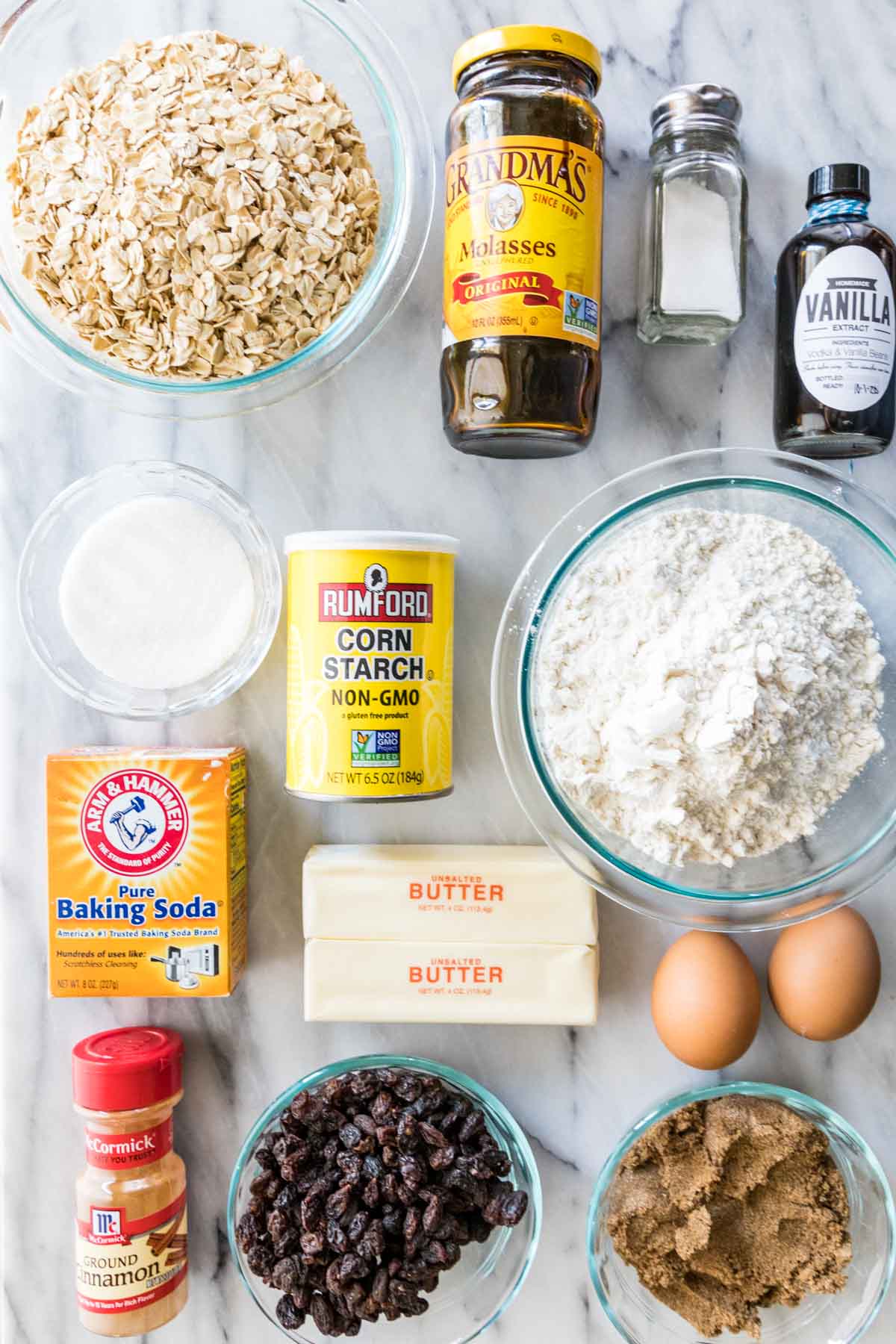 overhead view of ingredients including raisins, oats, flour, molasses, and more