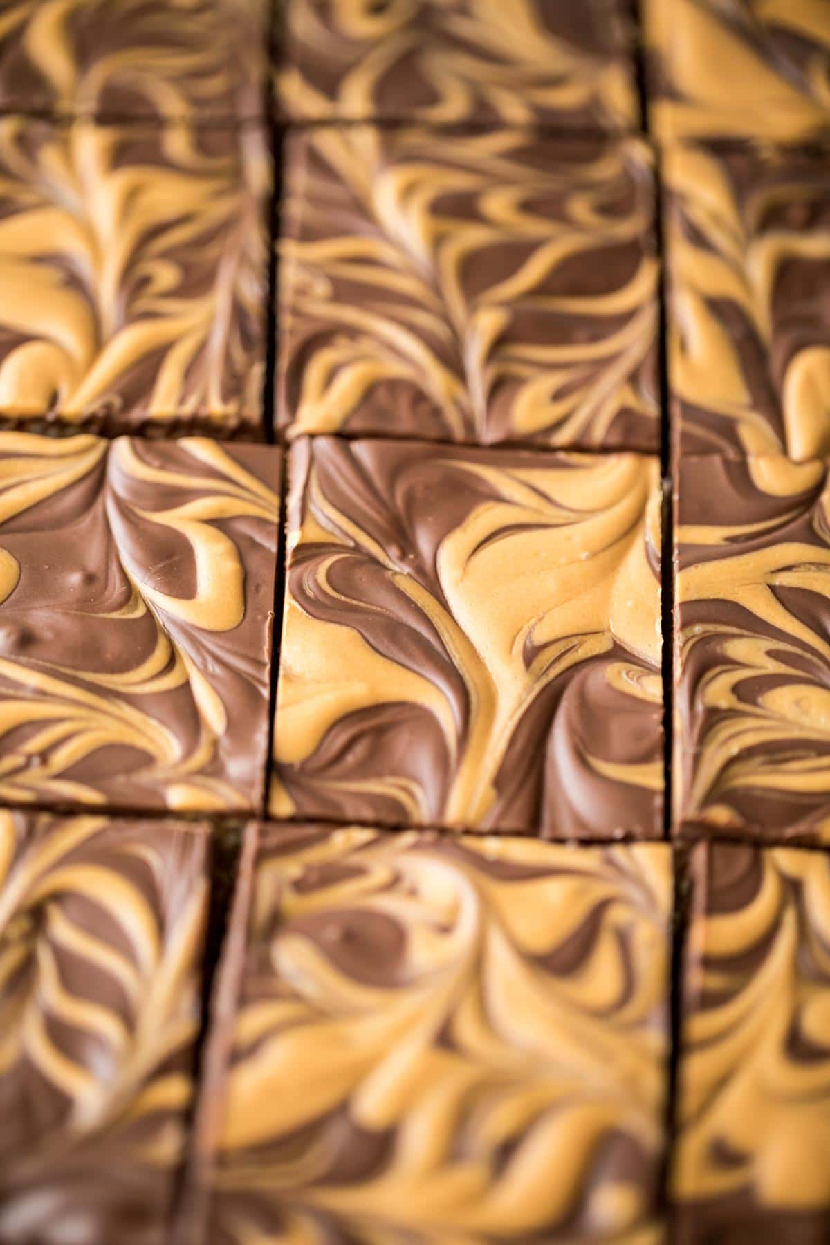 swirly butterscotch and chocolate topped cereal bars just after cutting