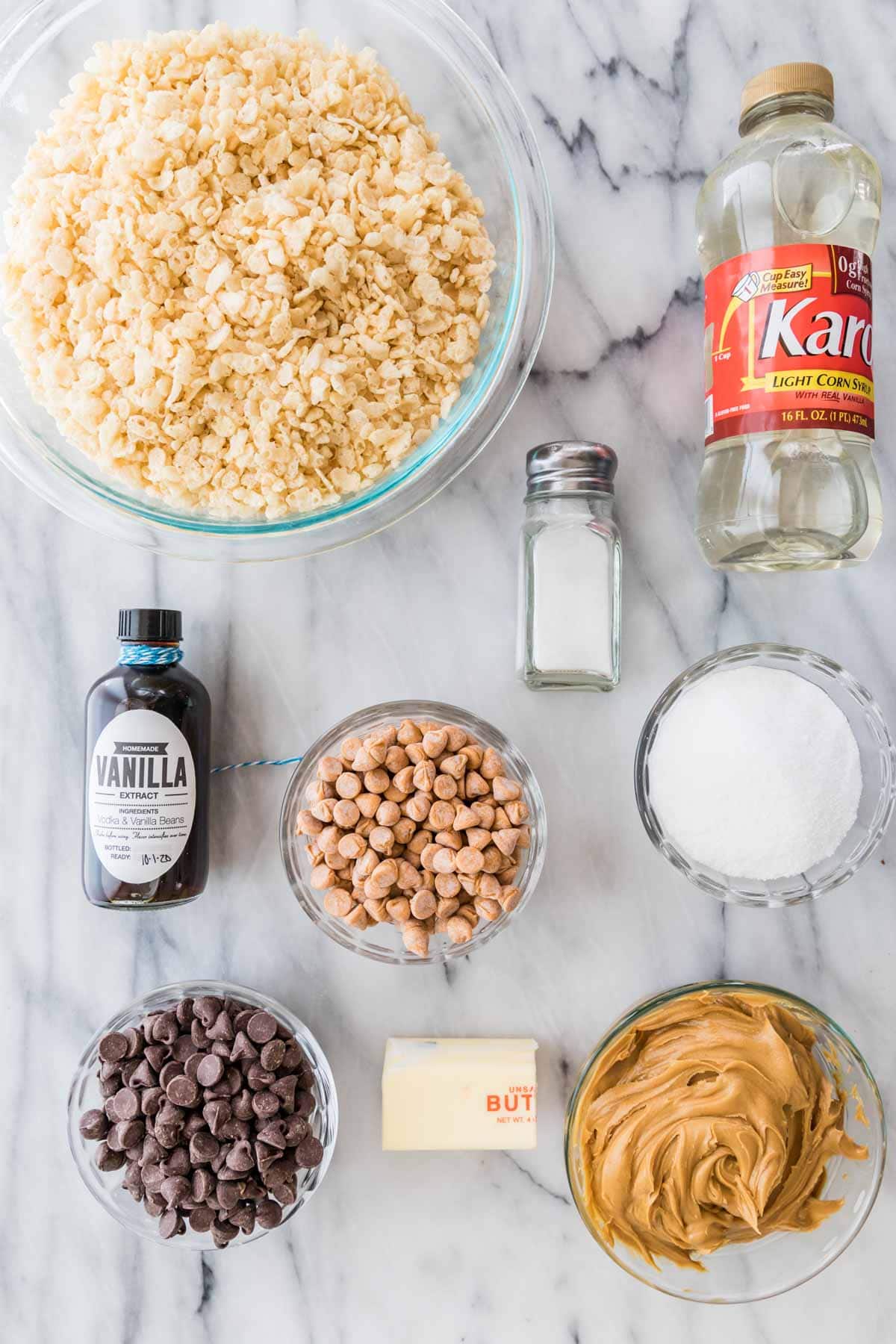 overhead view of ingredients including rice krispies cereal, butterscotch chips, peanut butter, and more