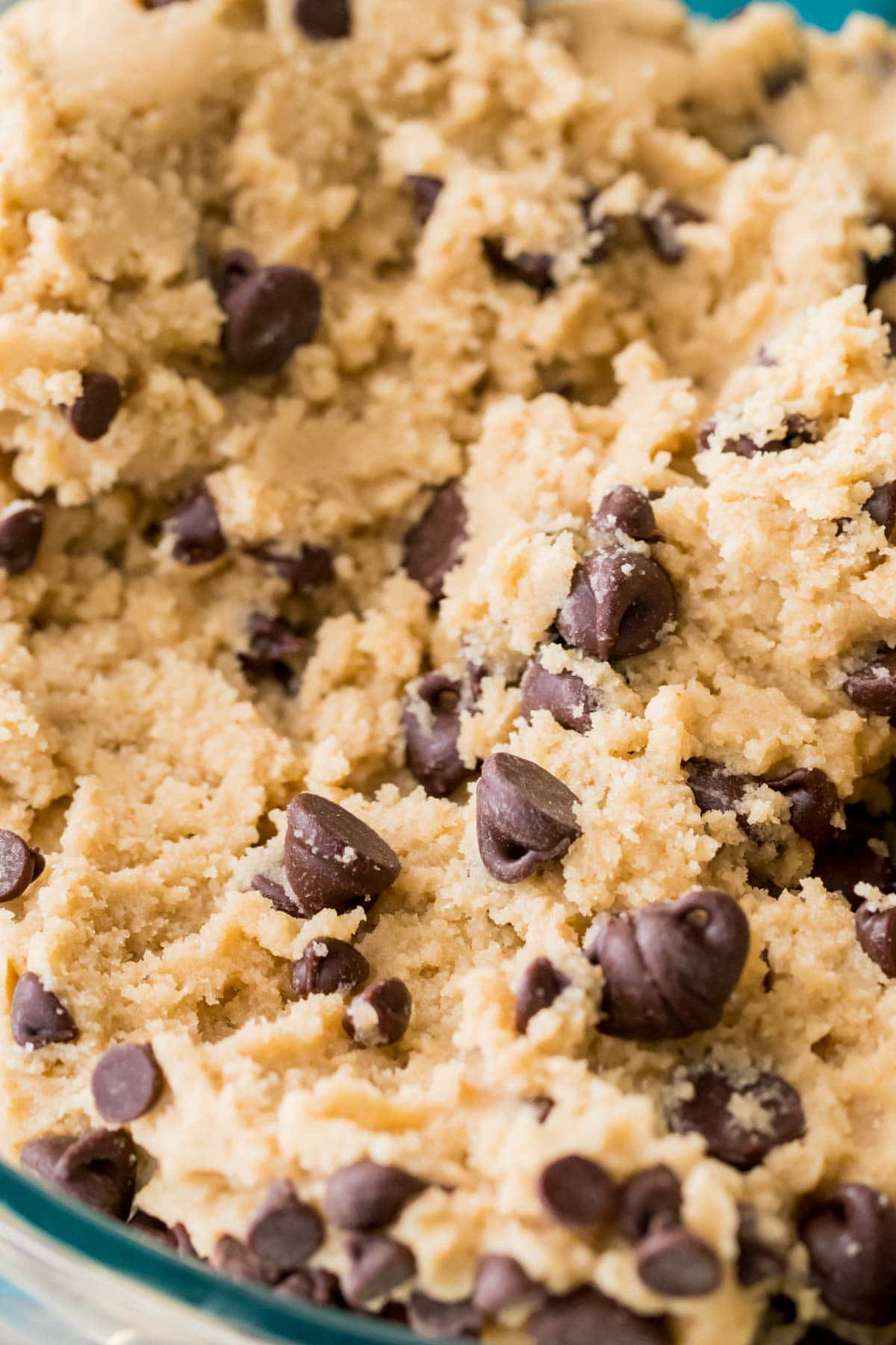 zoomed in view of cookie dough studded with chocolate chips