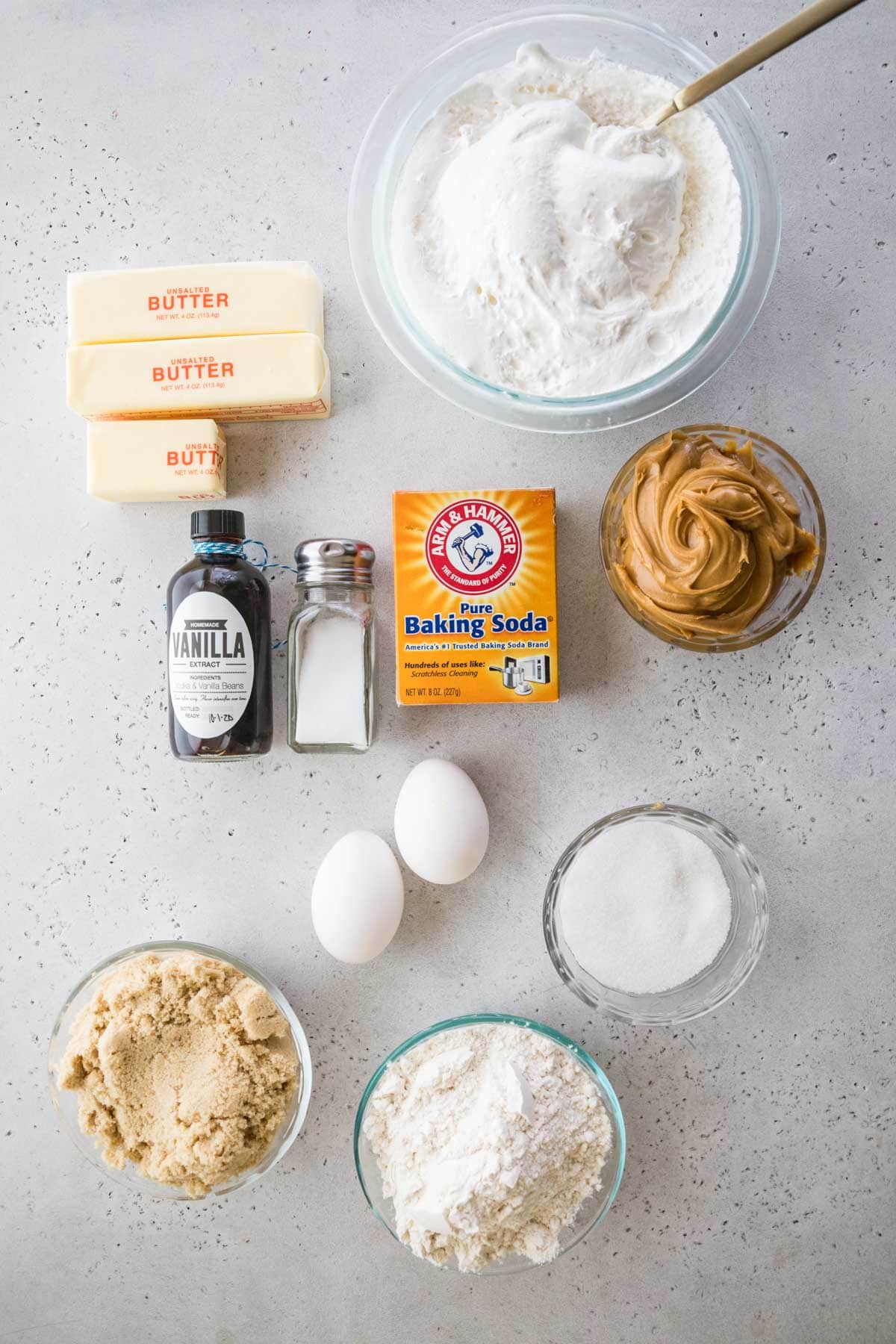 overhead view of ingredients including peanut butter, brown sugar, eggs, flour, and more