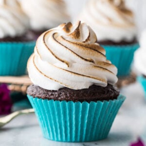 chocolate cupcake frosted with marshmallow icing that's been toasted with a culinary torch