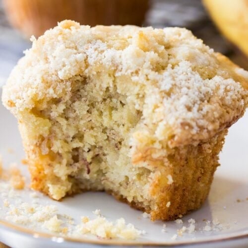 streusel topped banana muffin missing a bite