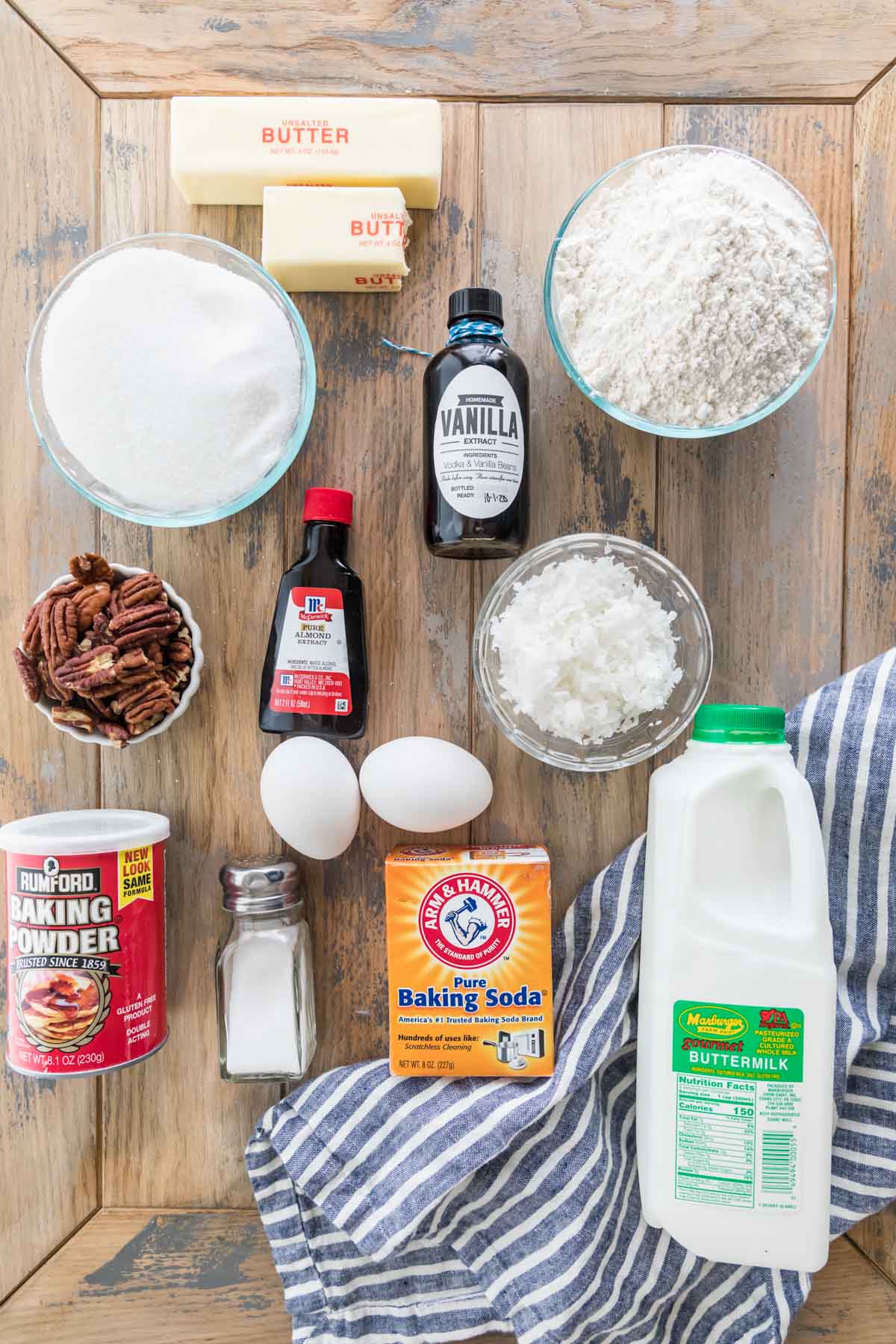 top-down view of ingredients including coconut, pecans, buttermilk, flour, and more