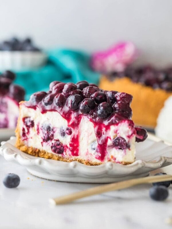slice of blueberry cheesecake topped with blueberry topping