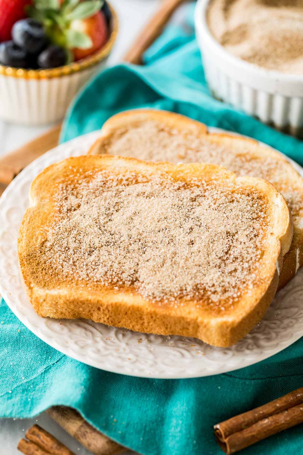 buttered toast slices topped with cinnamon and sugar