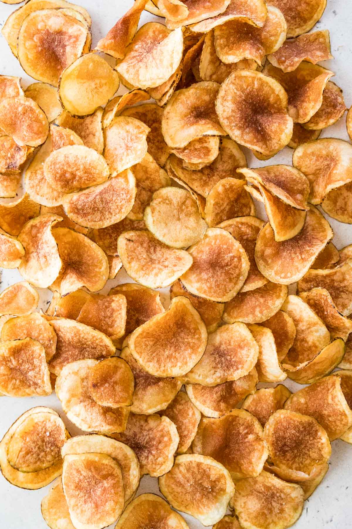 overhead view of golden brown homemade kettle chips