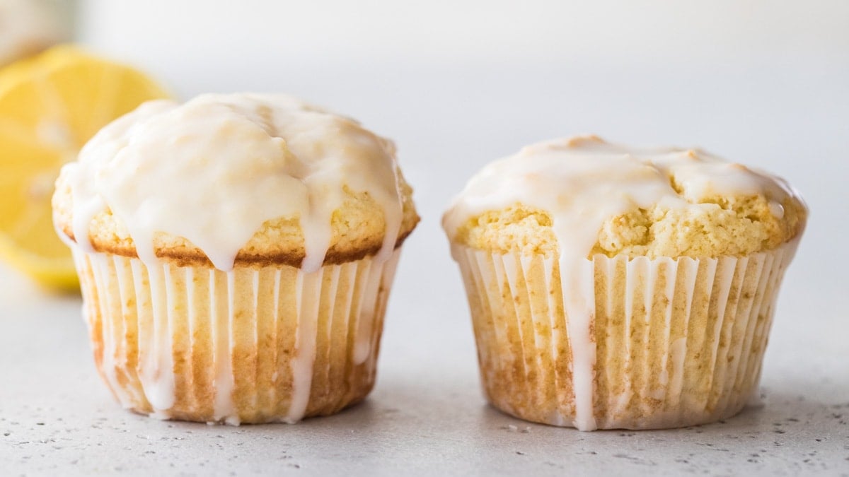 comparison of two glazed muffins, with the muffin on the left being much taller and rounder than the muffin on the right