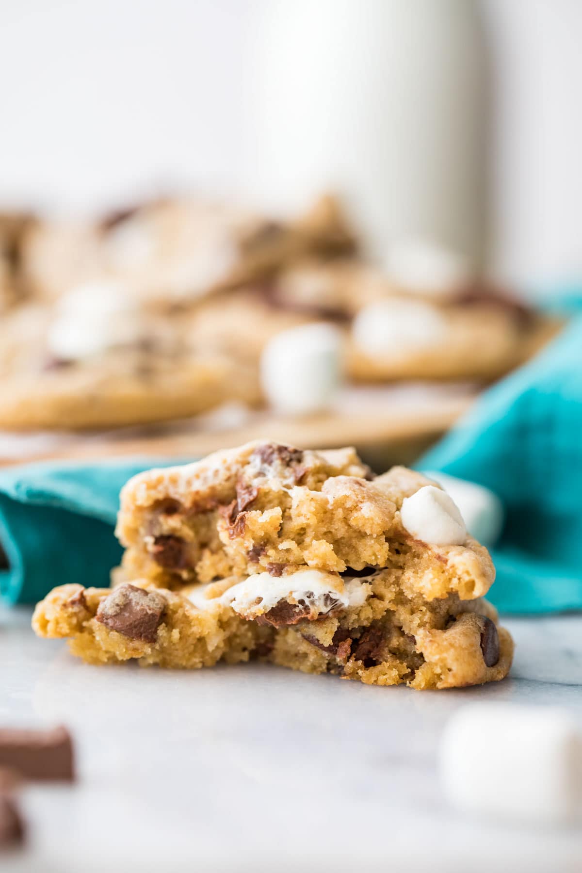 cross section of a cookie made with chocolate pieces and marshmallows