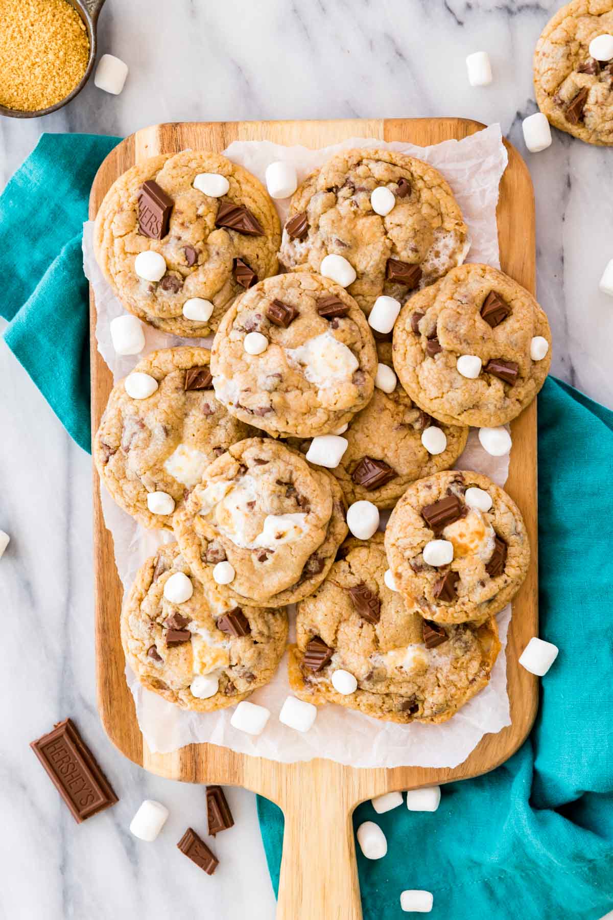 overhead view of smores cookies topped with chocolate and marshmallows